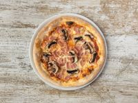 67833_TrattoríaDiGuzmánSantAntoni_Food_PizzaProsciuttoEFunghi